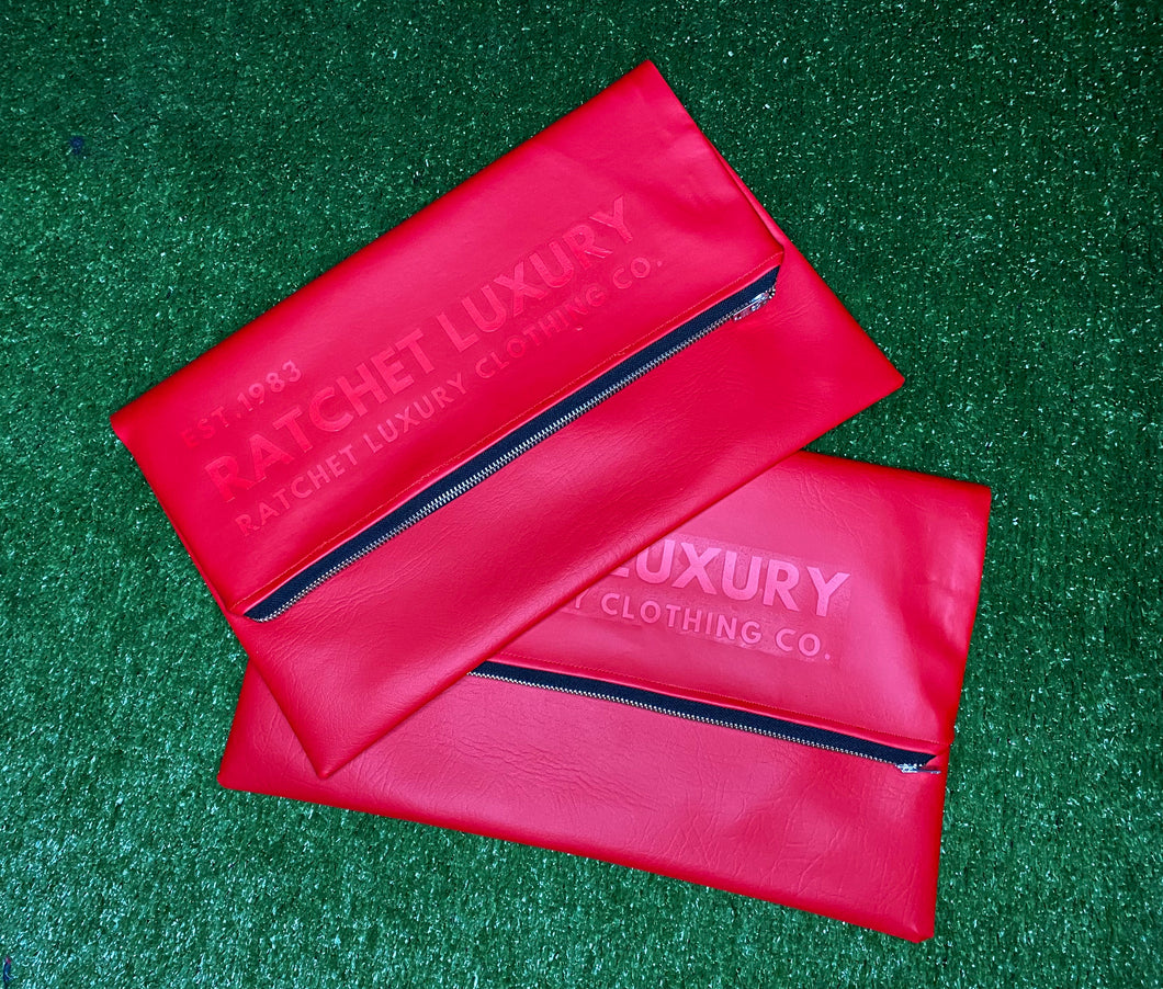 SIGNATURE FOLD OVER OVERSIZED CLUTCH - RED