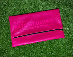 SIGNATURE FOLD OVER OVERSIZED CLUTCH - MAGENTA