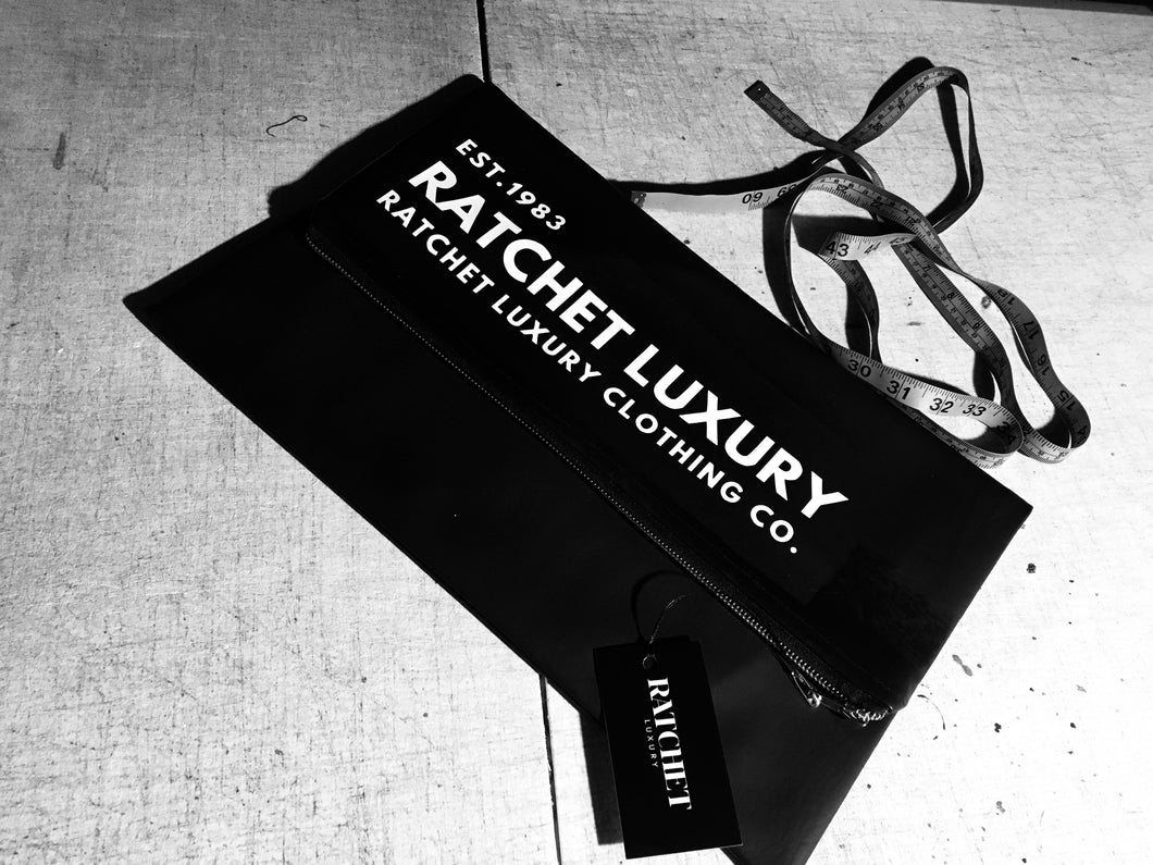 SIGNATURE FOLDOVER OVERSIZED CLUTCH